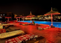 Resort pool at night.