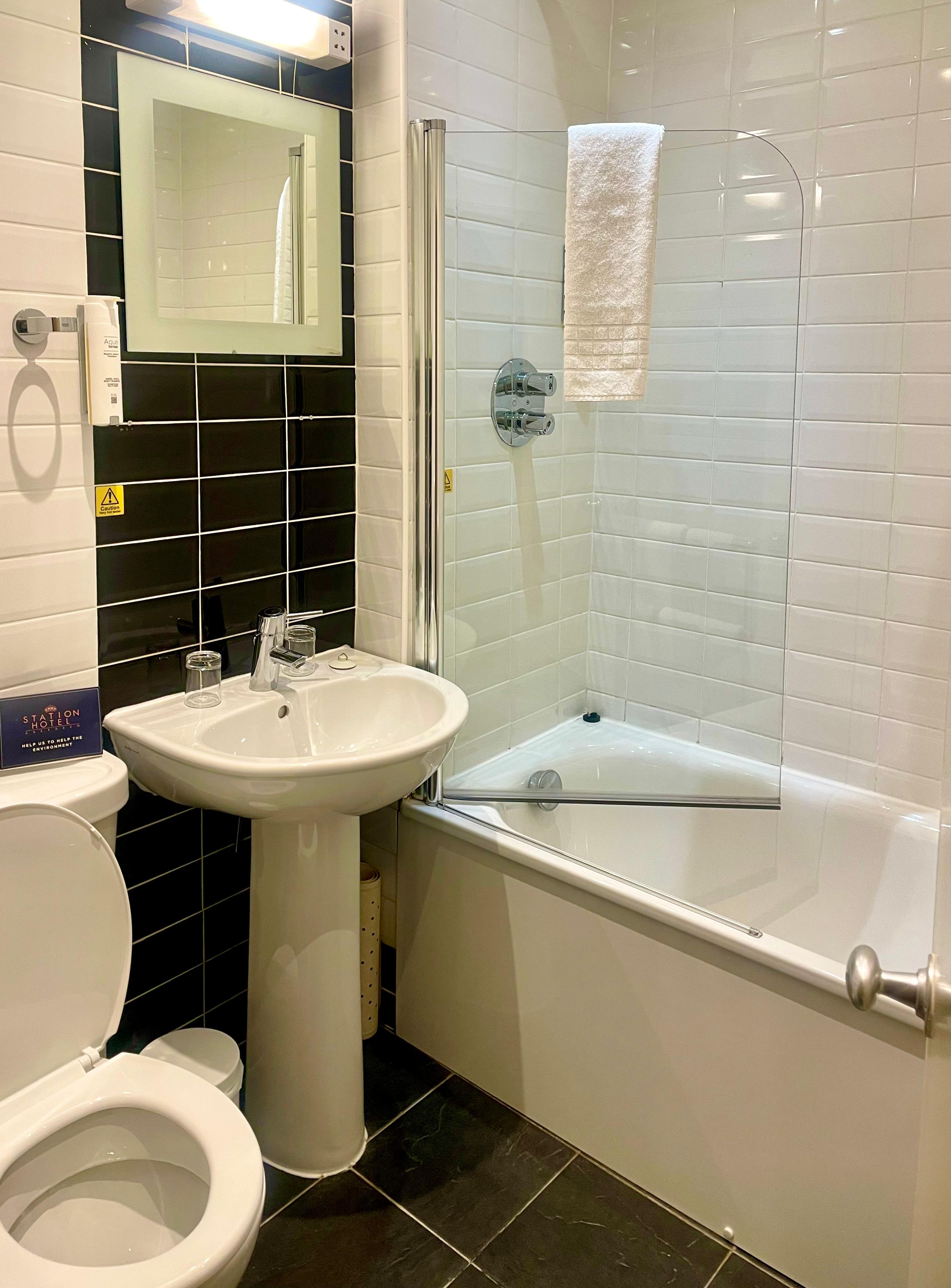 Spotless shiny bathroom.