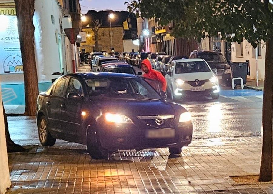 Parking situation around Parador de Zafra.  Brick building in far distance is the hotel complex