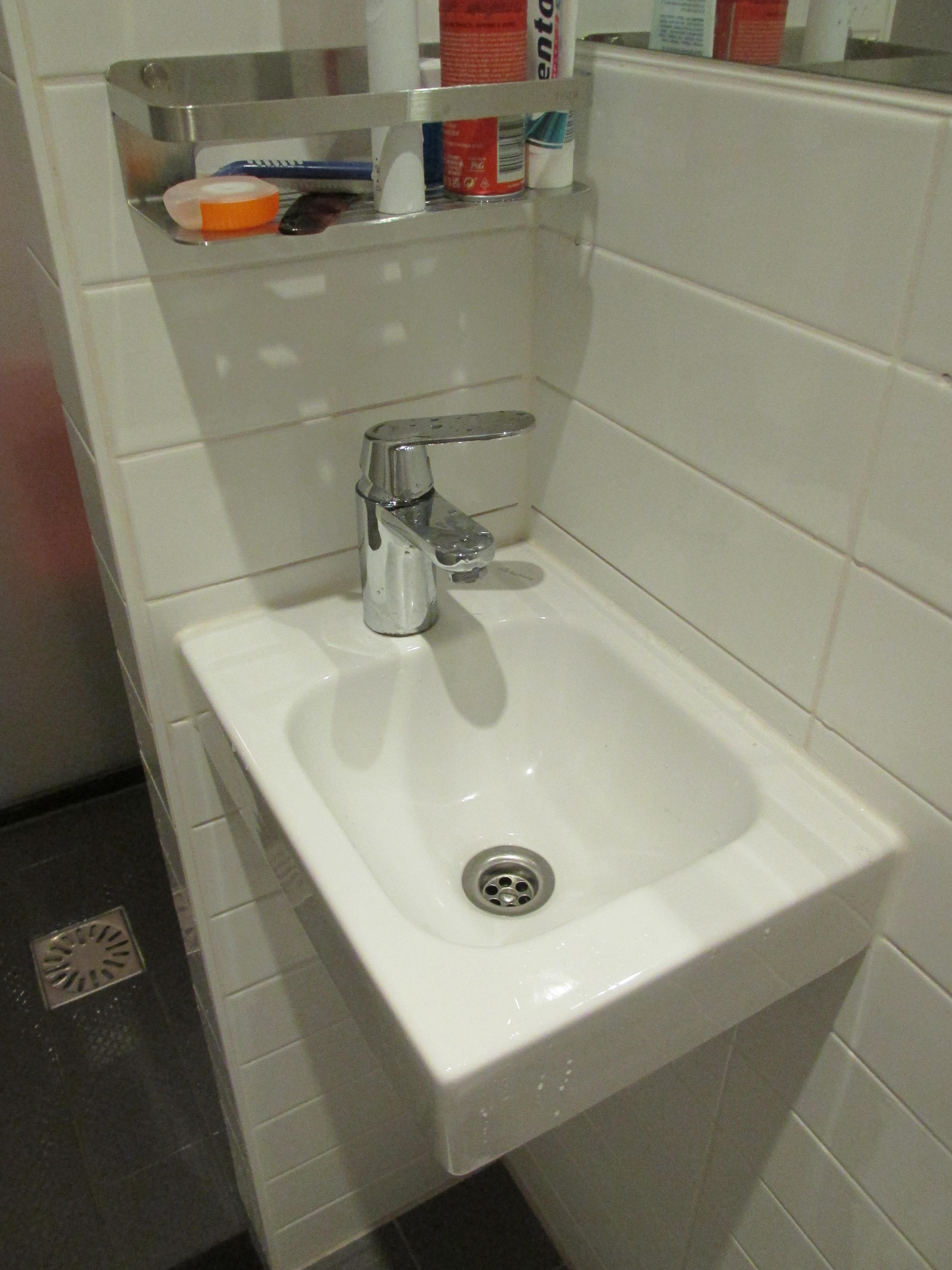 tiny sink, can hardly fit two hands in it