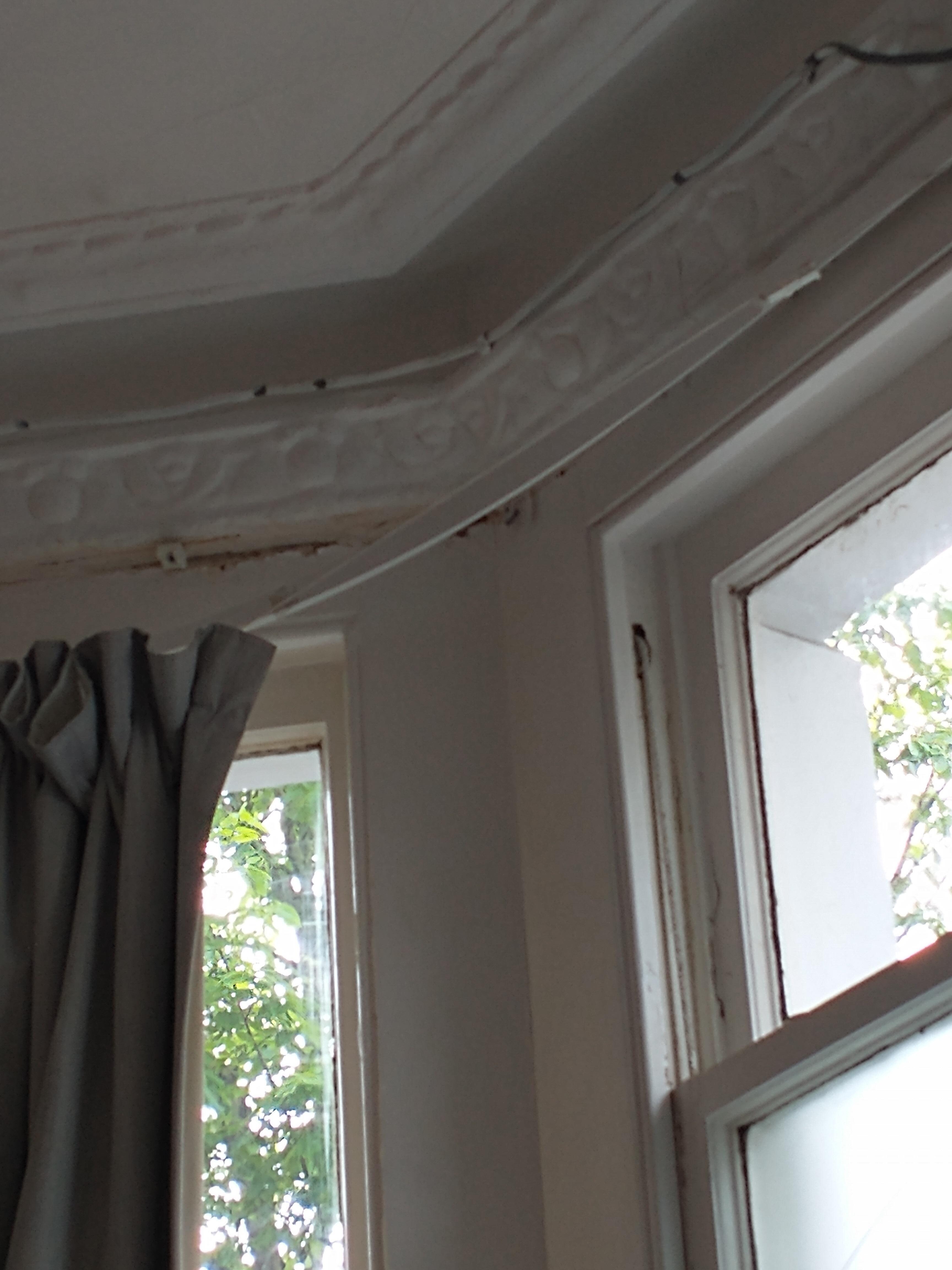 Curtain rail hanging off