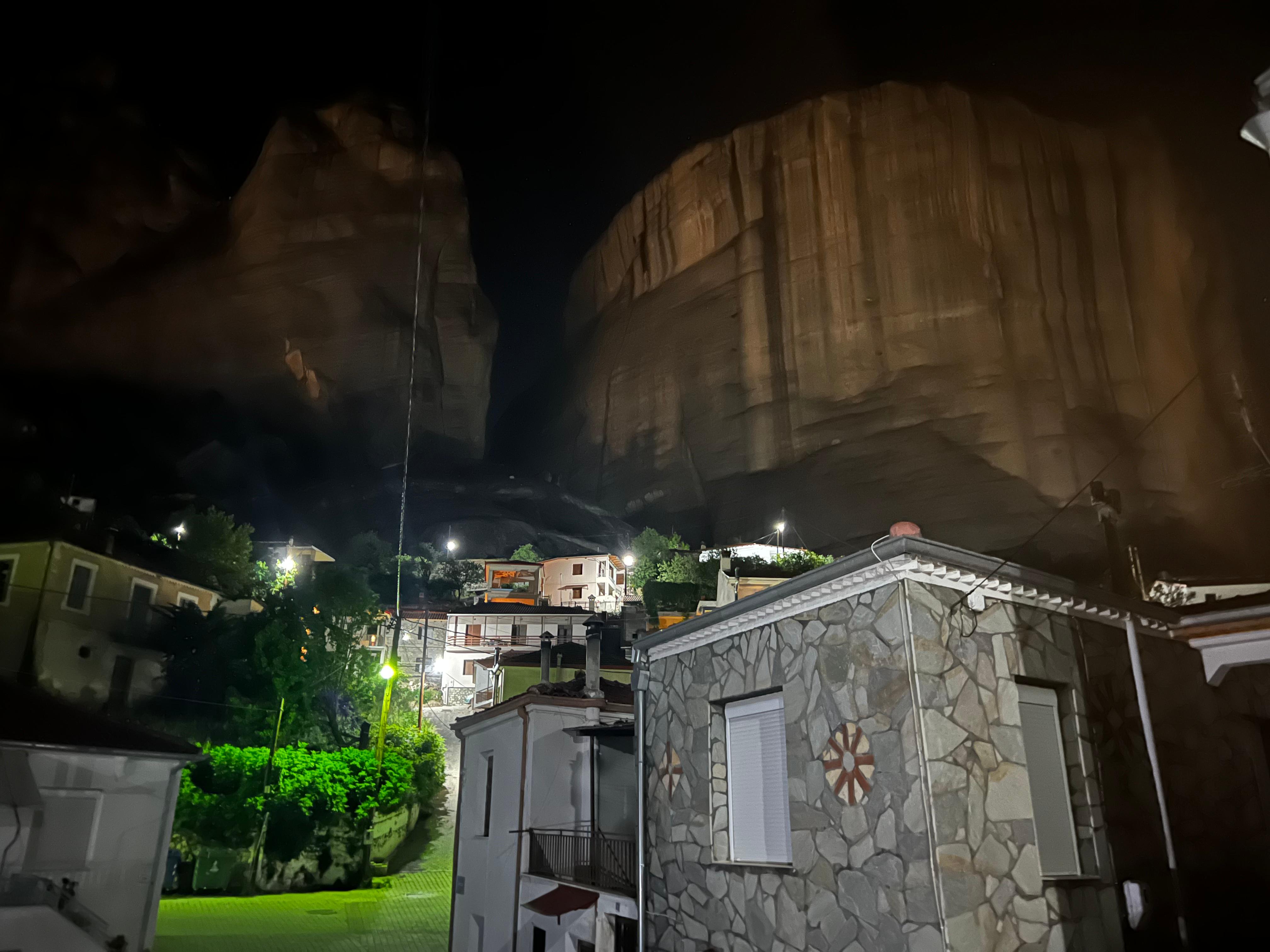 Rocks lit up at night create a stunning backdrop