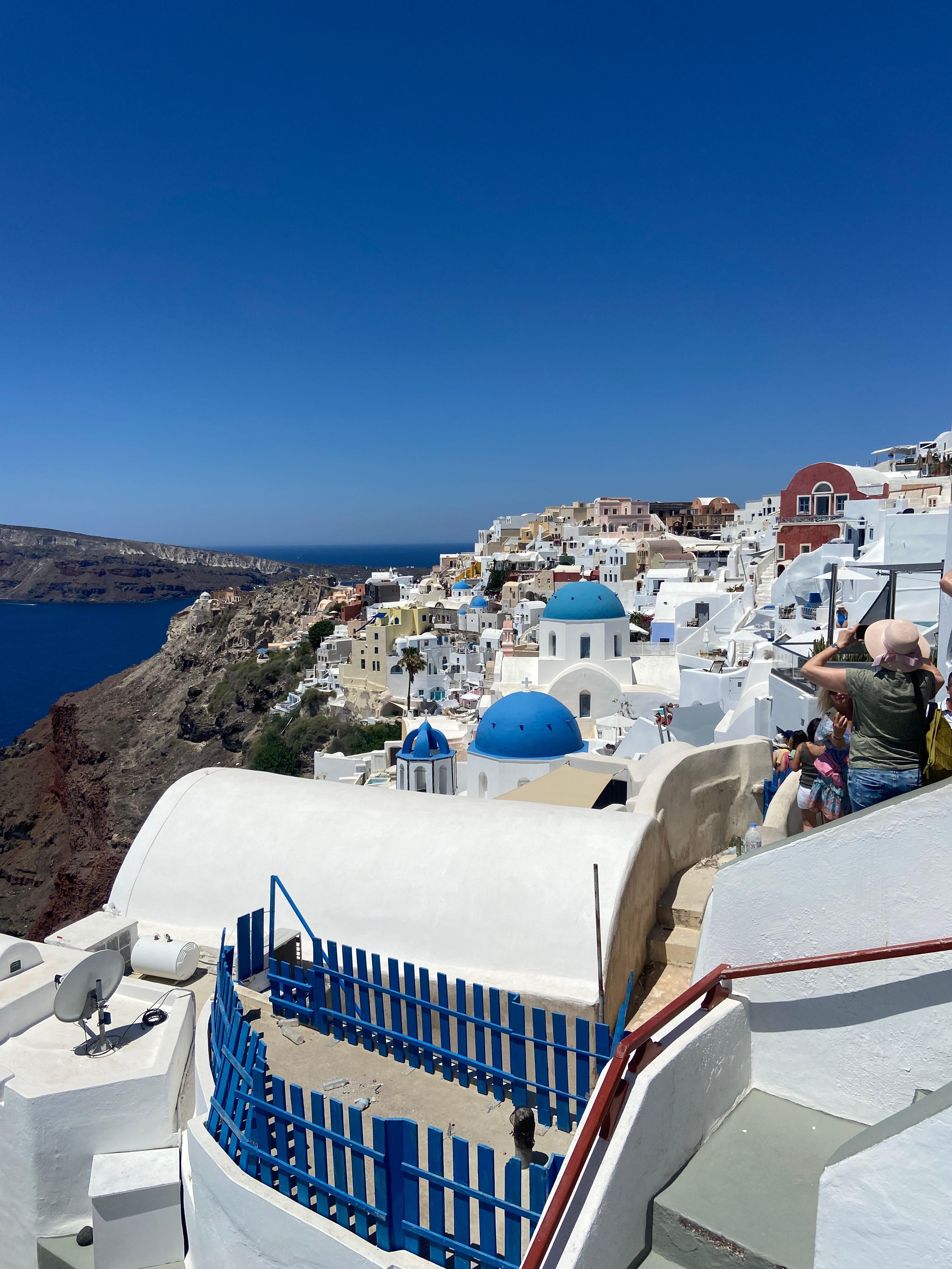 Classic view of Oia . Hotel is on this cliff face