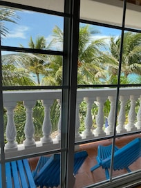 Balcony but, no sliding door. Need to go out of room to access it.