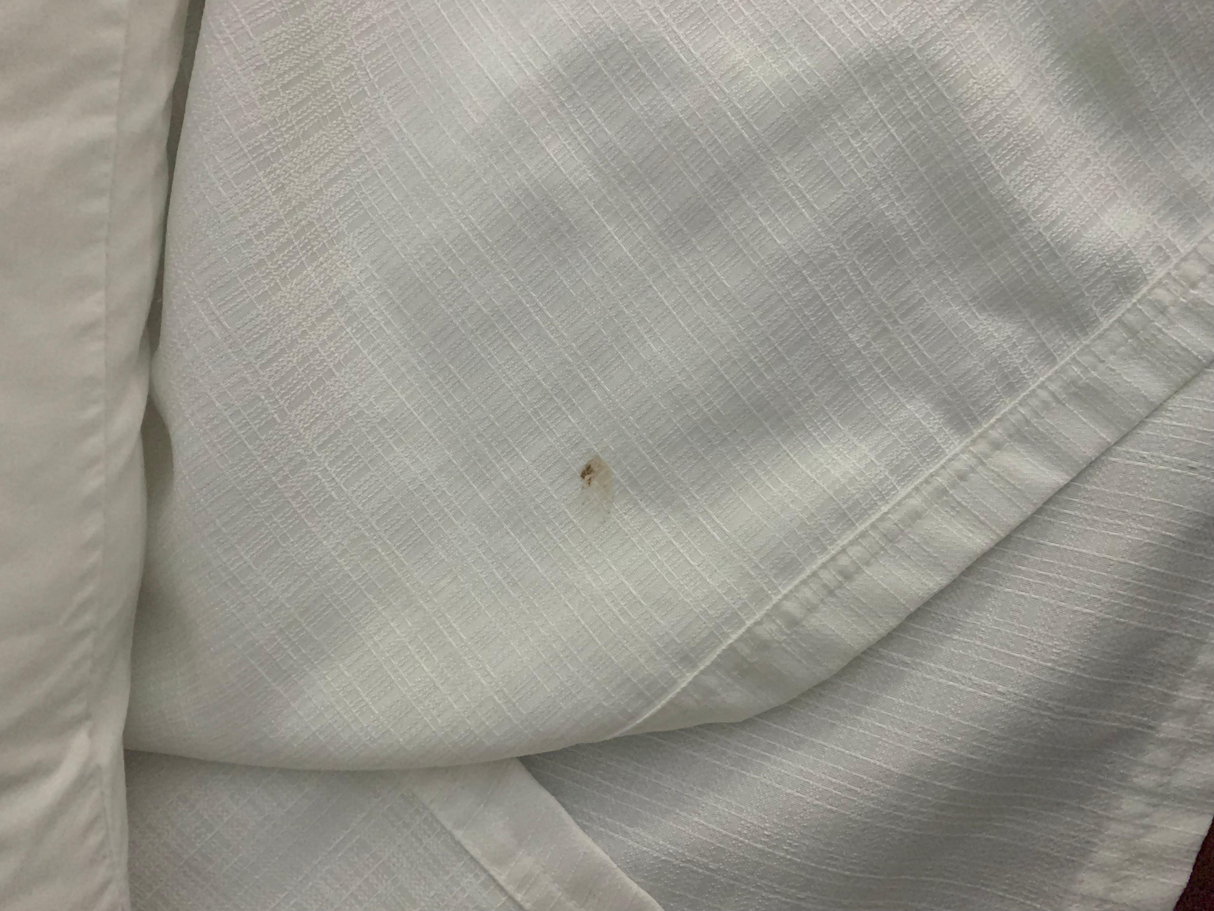 Stained coverlet