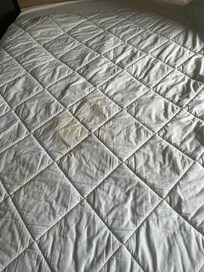 Big yellow stain on the sheet