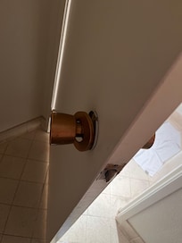 Poignet de la porte de la salle de bain