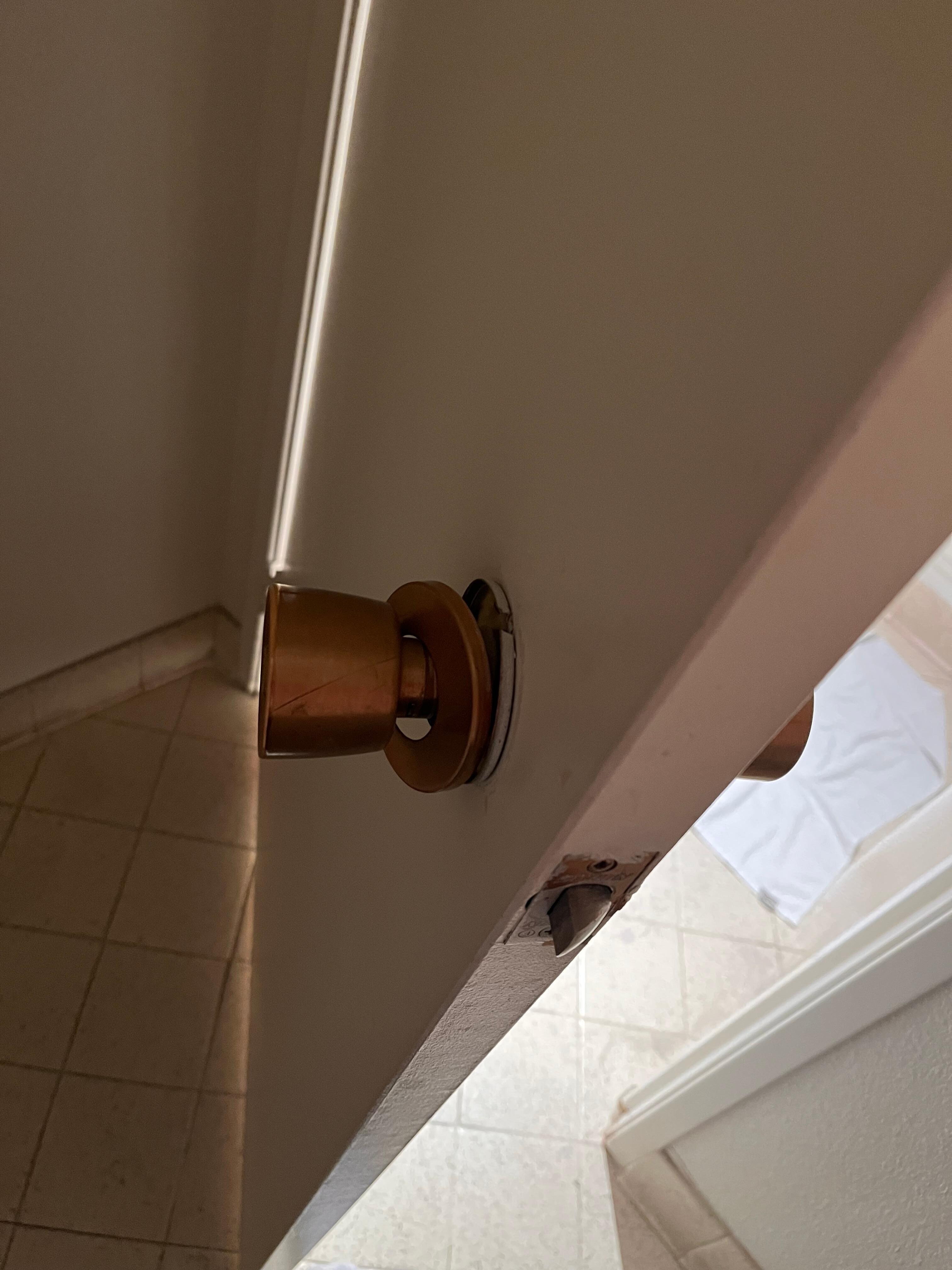 Poignet de la porte de la salle de bain