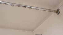 Barre de douche rouillée