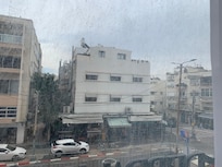 View from room on sunny day. Cloudy appearance is due to a filthy window.