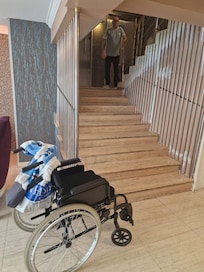 Reception on ground floor showing stairs to lift.