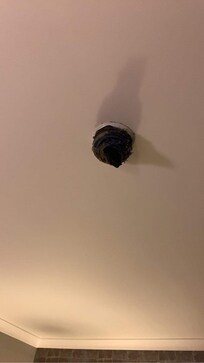 Disgraceful dirty sock on the smoke alarm
