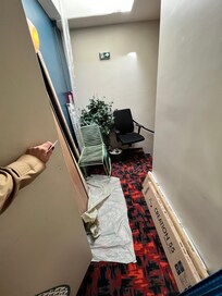 Items causing obstruction at staircase / fire escape route
