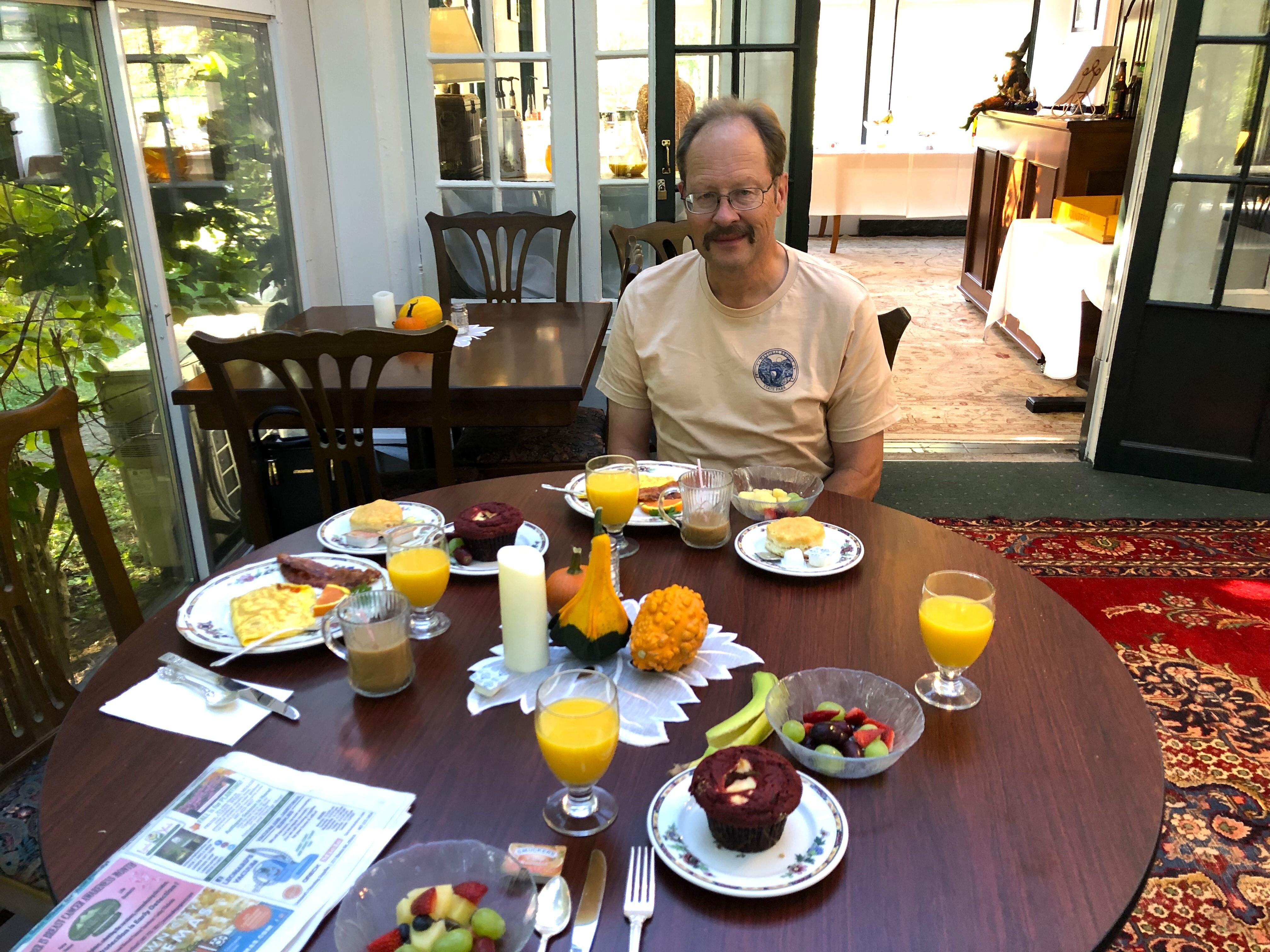 Husband ready to eat fabulous brkfast by Shelley if I would stop taking photos!