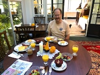Husband ready to eat fabulous brkfast by Shelley if I would stop taking photos!