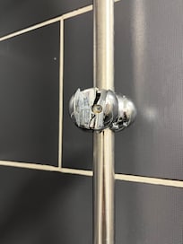Support de douche cassé