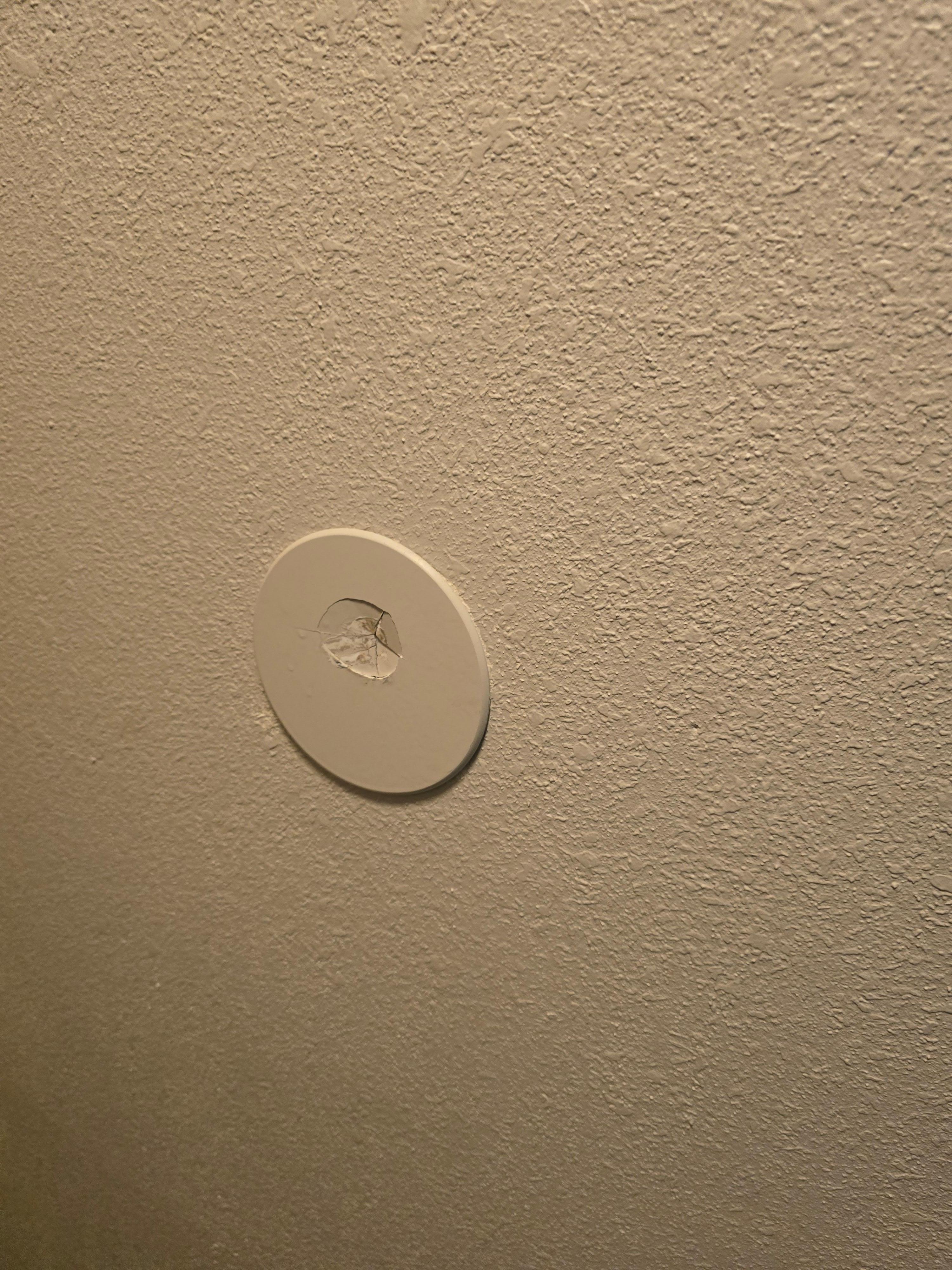 Broken Plate on wall