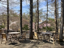 Communal deck in front of the small hotel cafe.