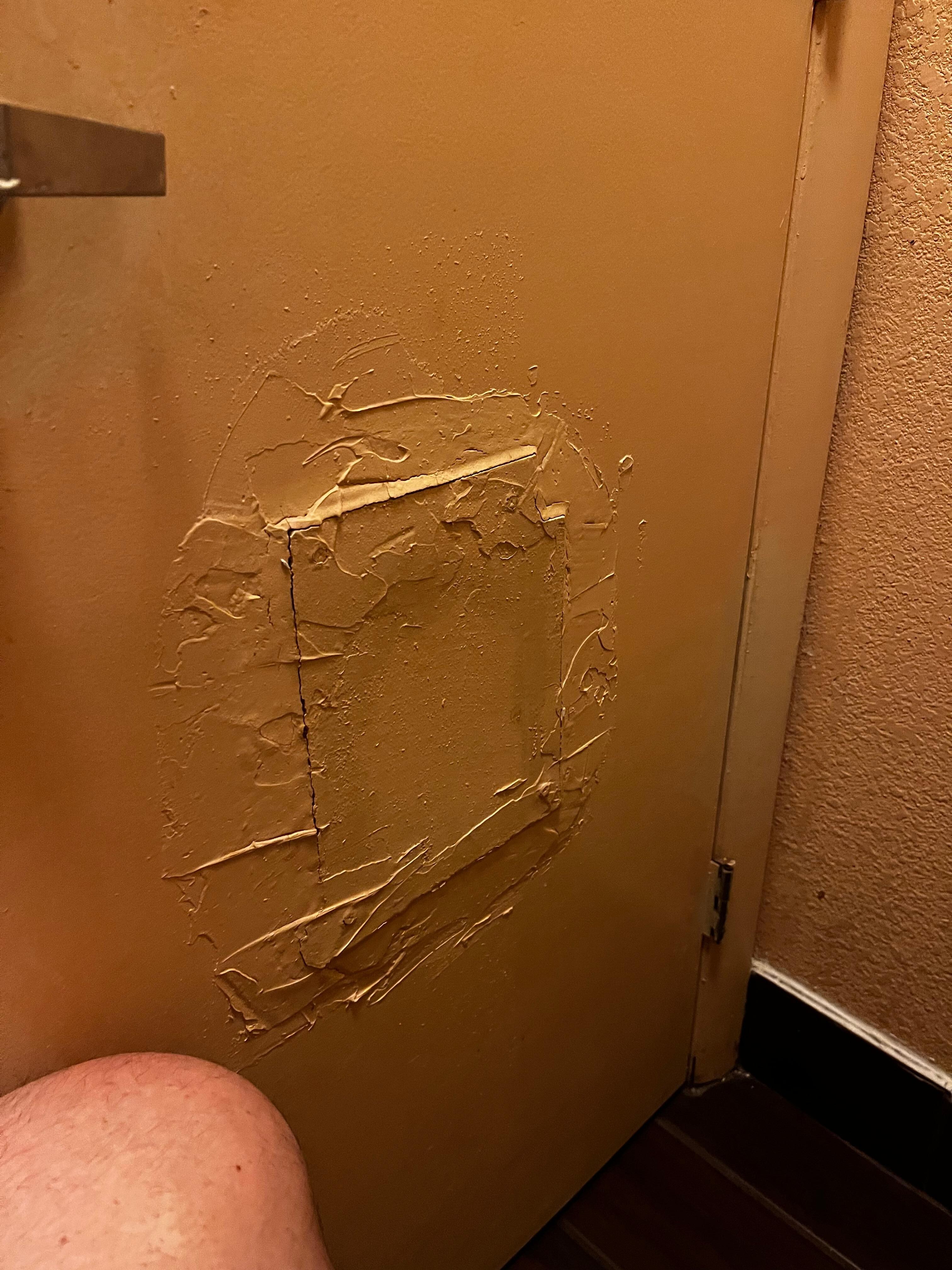 Hole in bathroom door