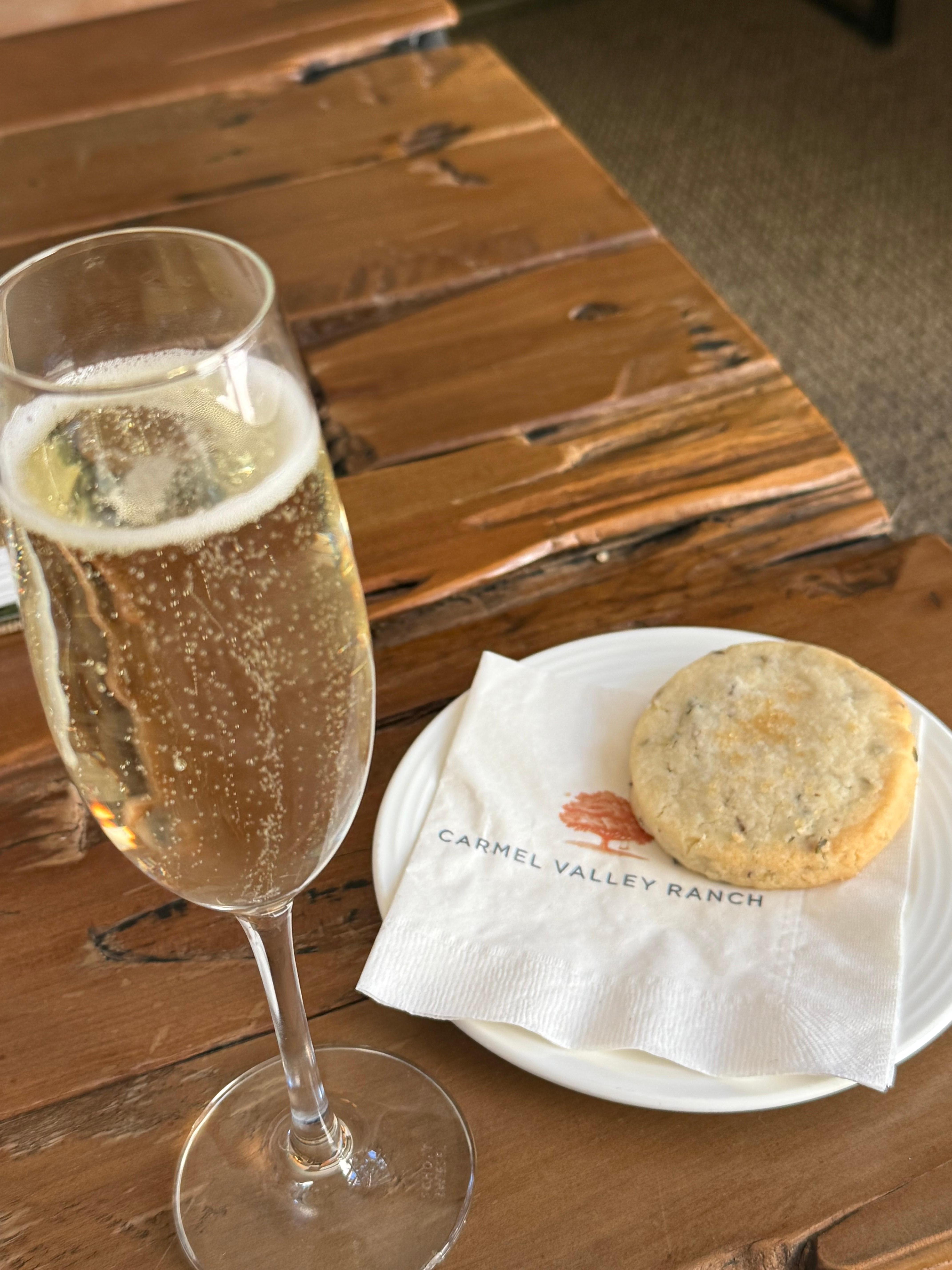 complimentary champagne and lavender shortbread after massage treatment