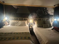 We had already settled in when this was taken, but it shows the rich paint color and gold crown moulding. The lamps were all unique and look very expensive