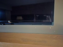 Paint chips around the tv.