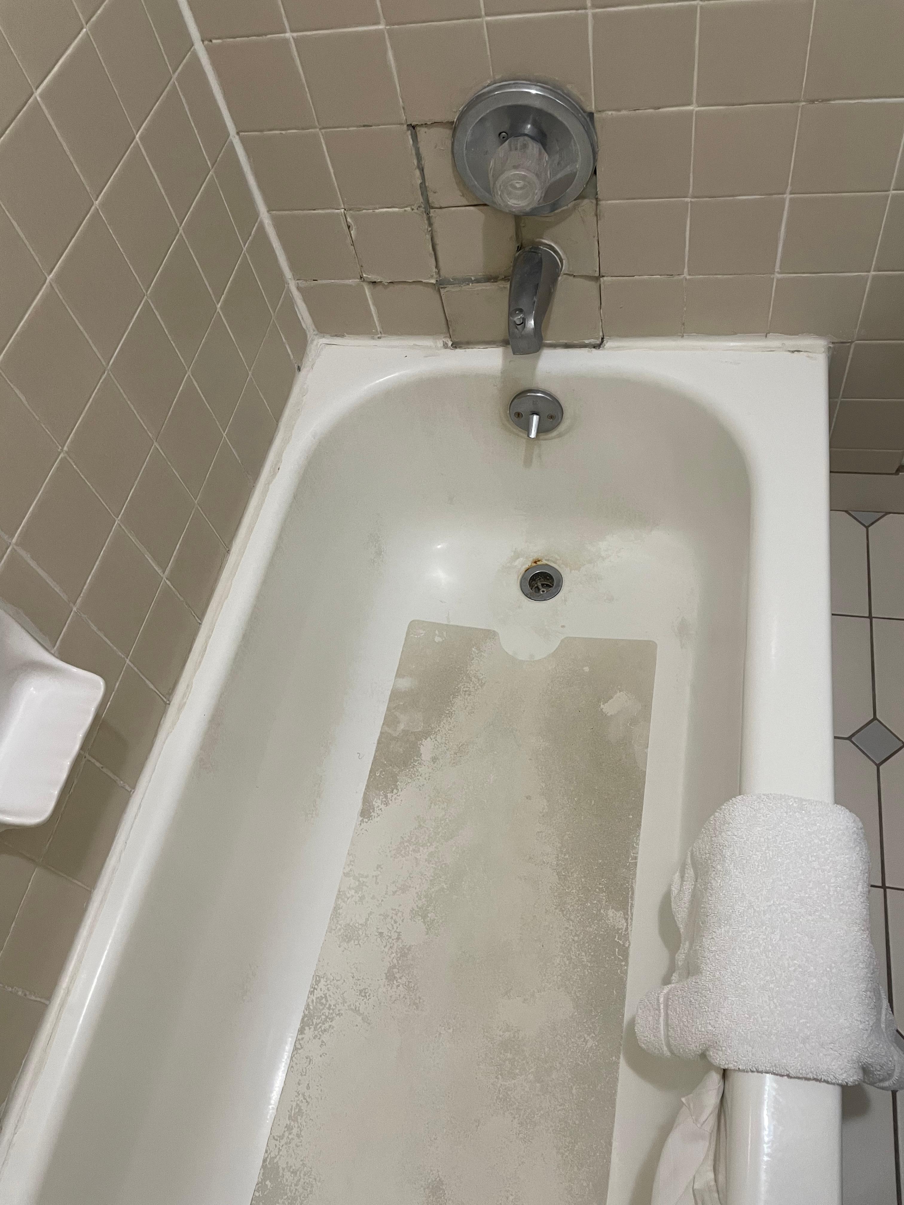 Bathtub was a horror show - from the grime to the collapsed tile. 