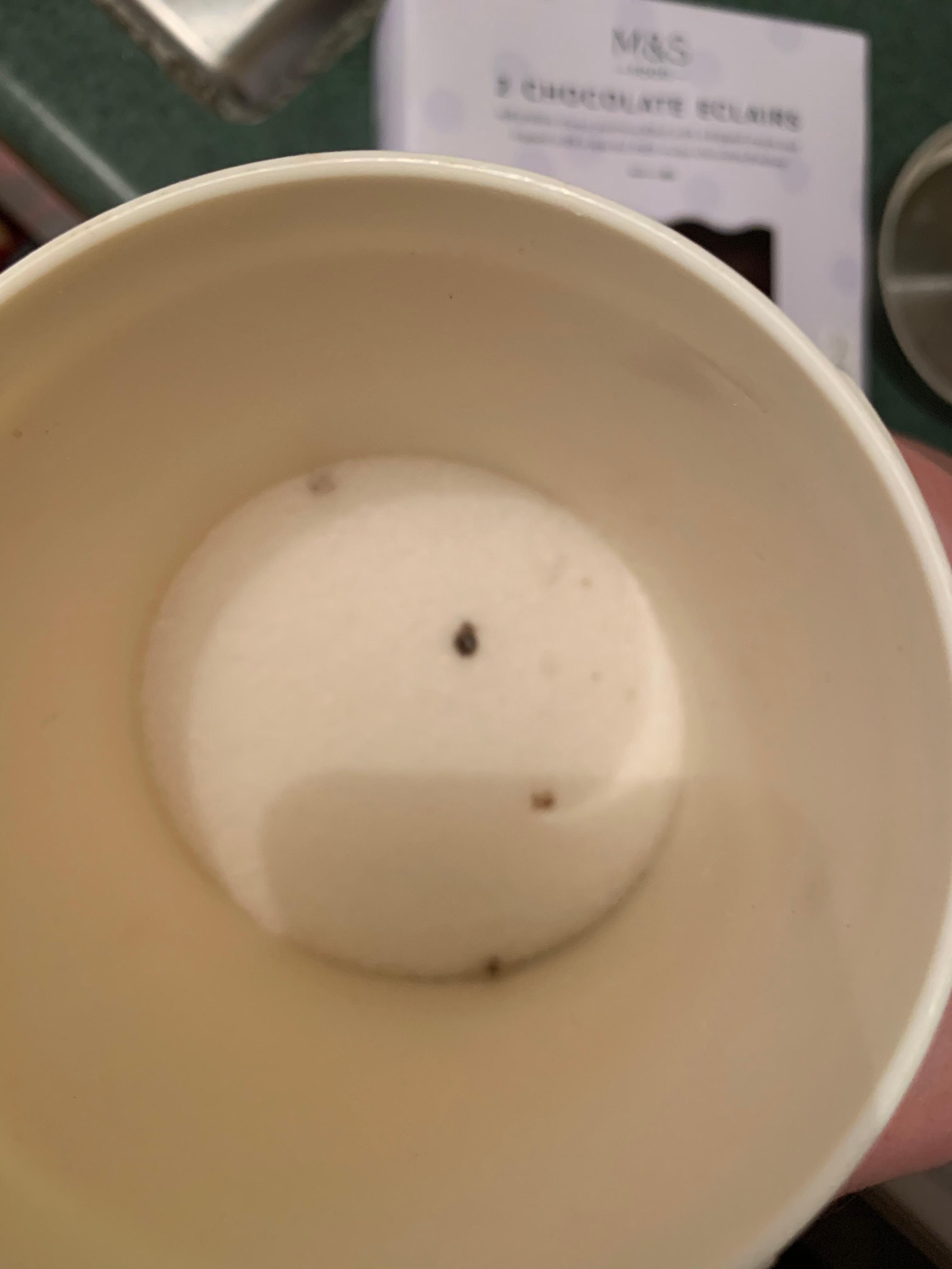 Sugar in kitchen with black lumps 