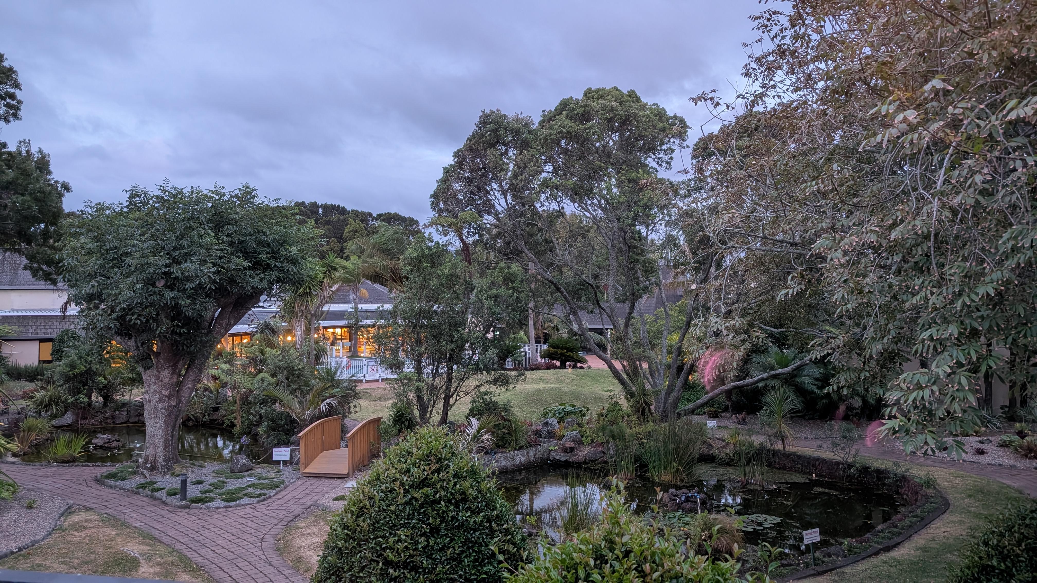 Grounds outside with ponds, bridge, pool area and plenty of places to hang out.