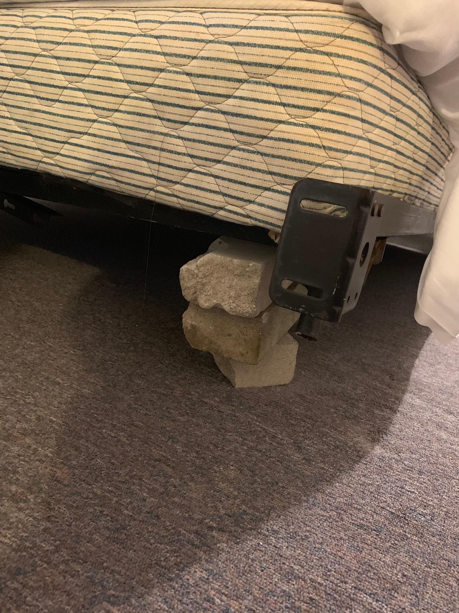 Concrete blocks under the bed