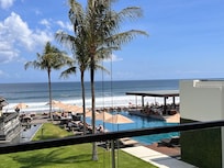 View of the pool n beach from lobby
