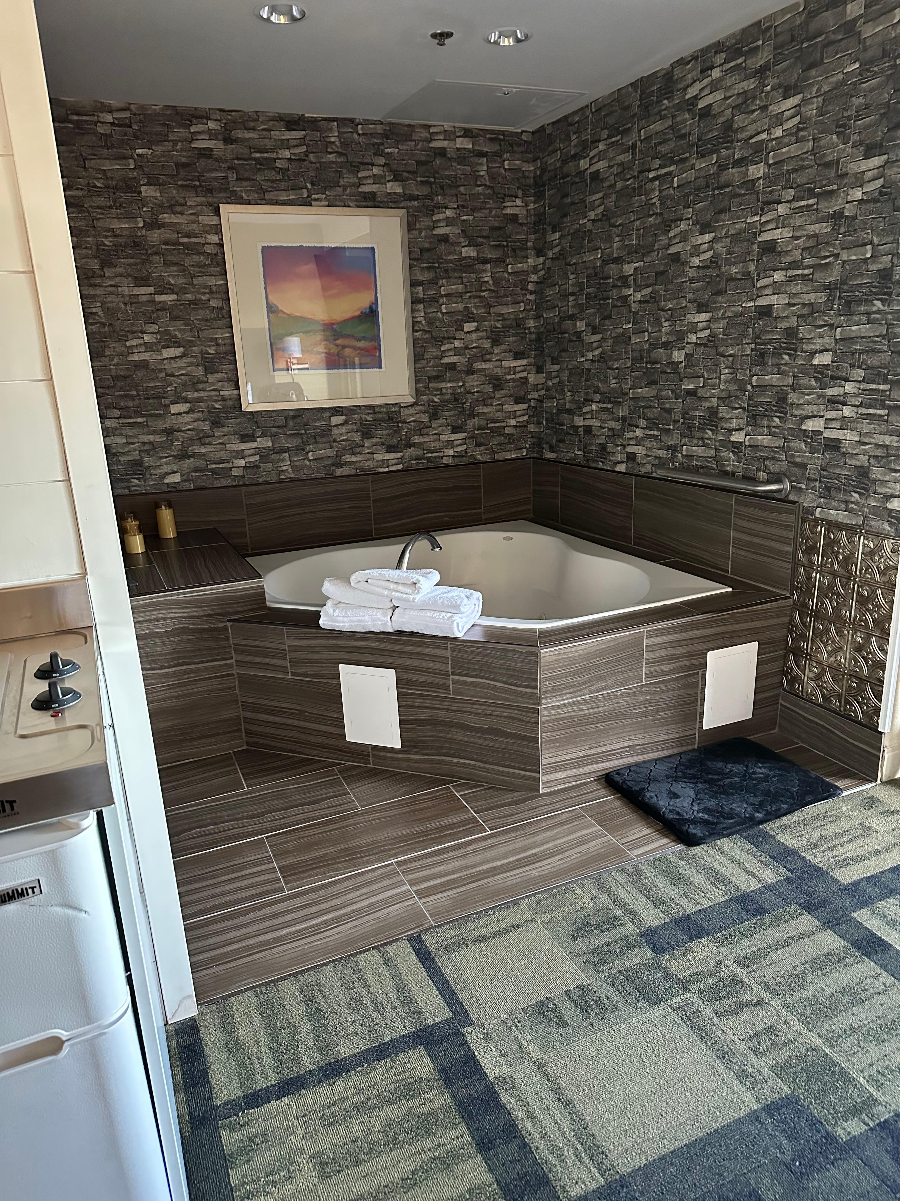 Room 101 has a hot tub and a kitchenette. It is also wheelchair accessible. 