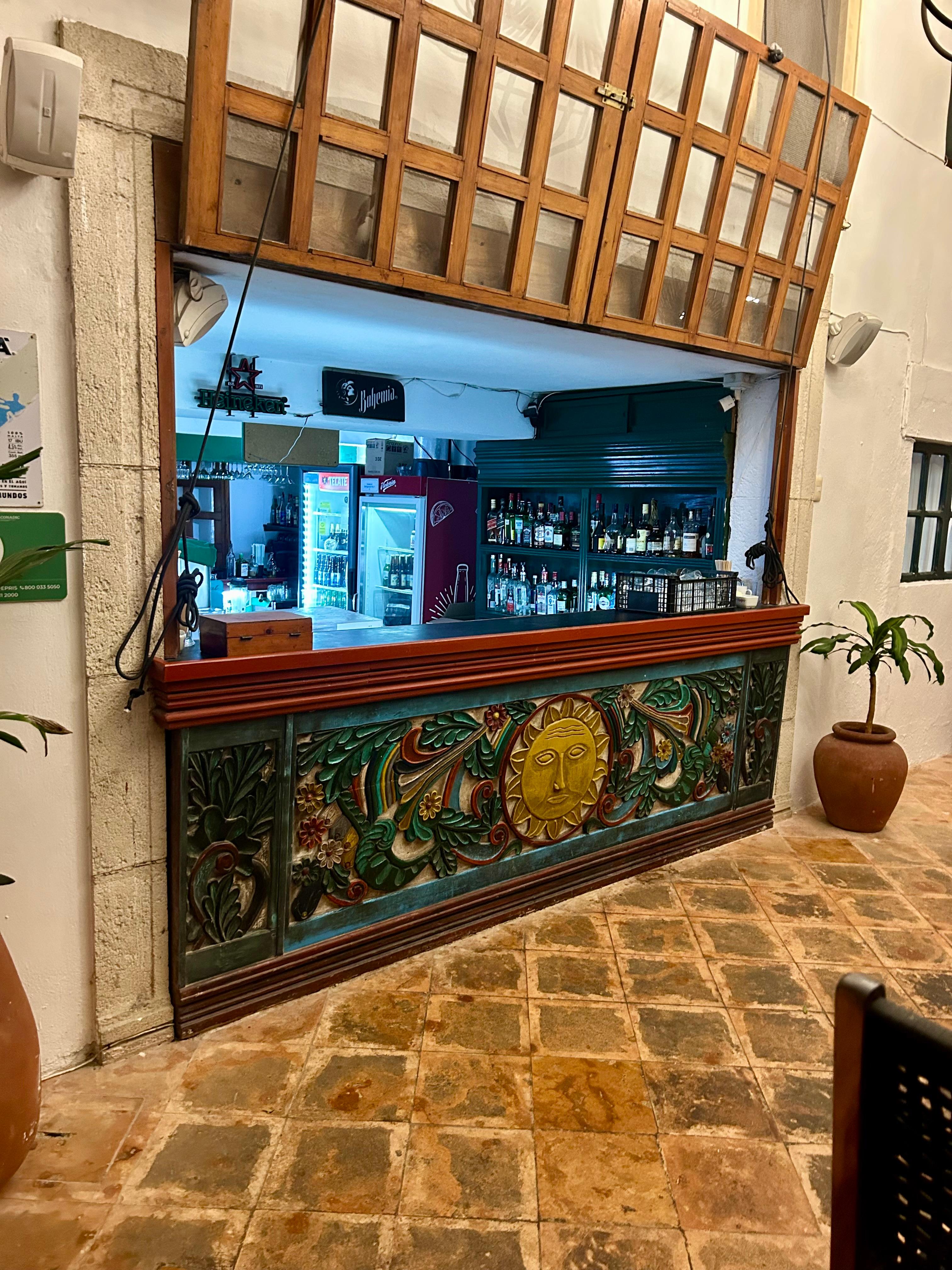 Bar facing the swimming pool courtyard 