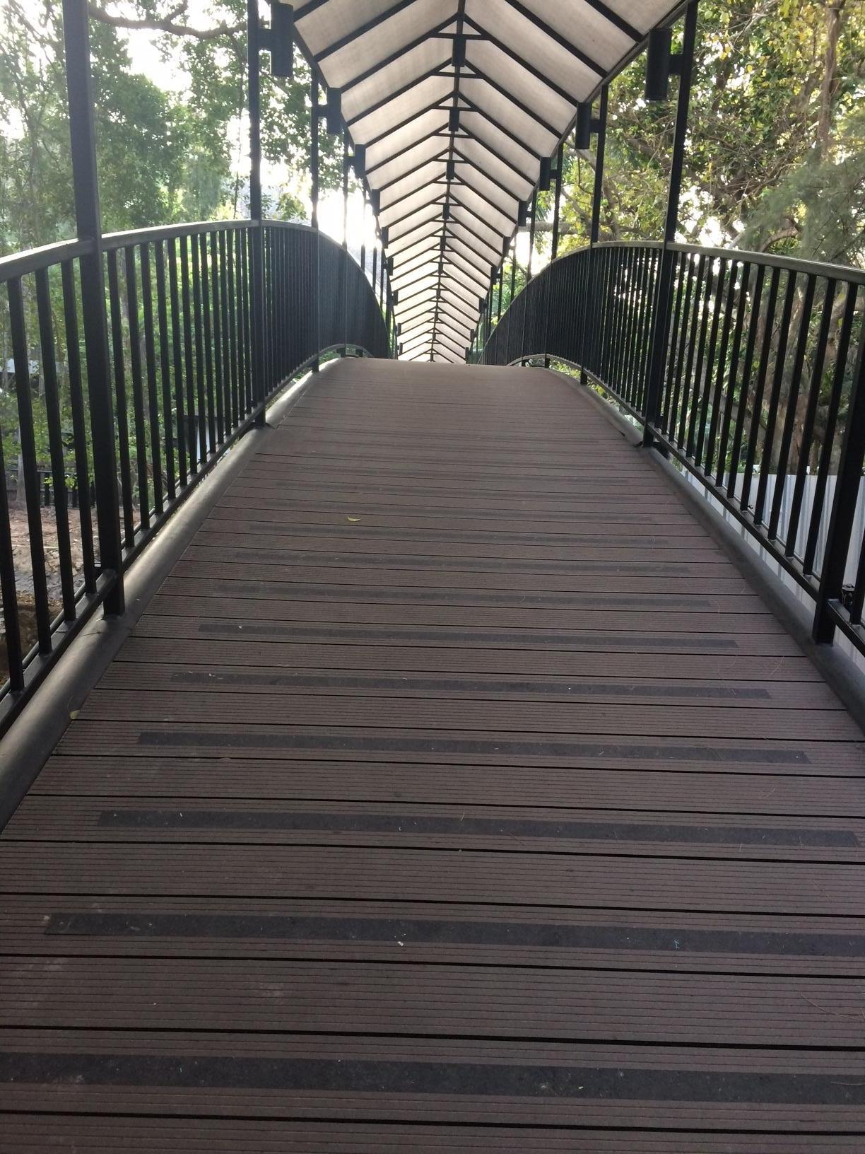 Steep bridge over the river of sewer