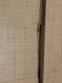 Bathroom tile loose and coming up