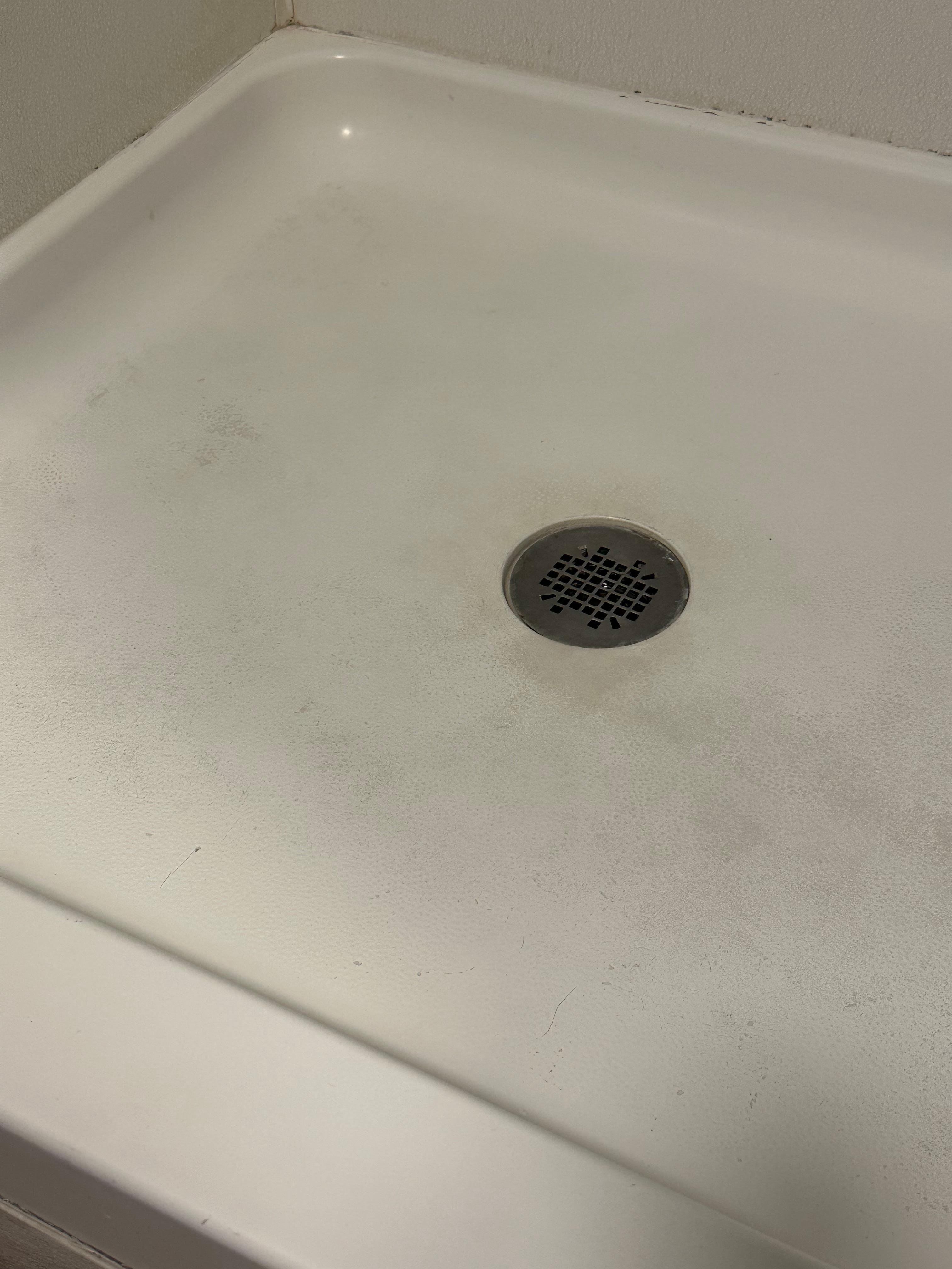 Paint stains inside shower liner