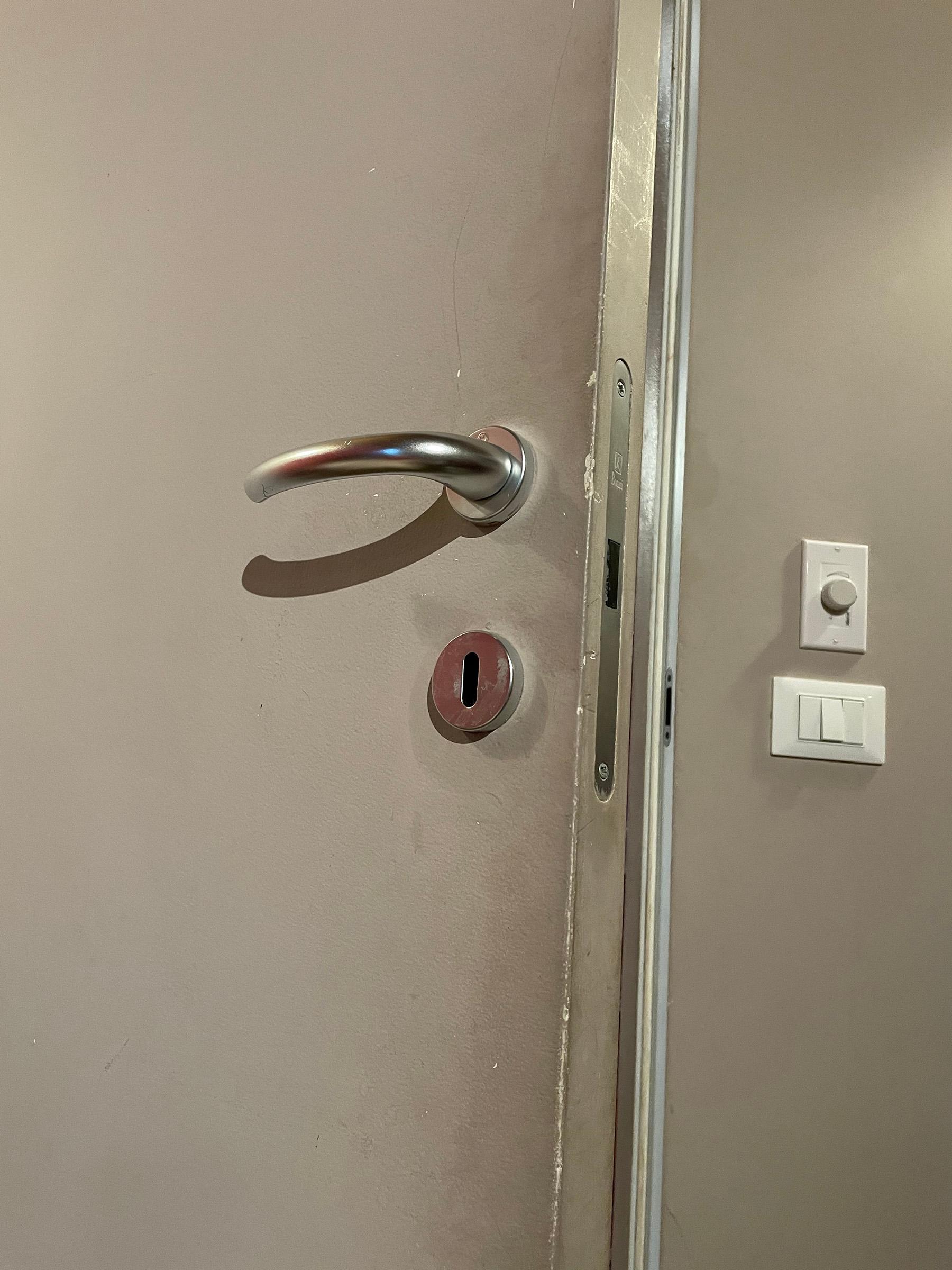 Does anyone use the door handle? No. Does anyone wipe down the door? Also, no. 