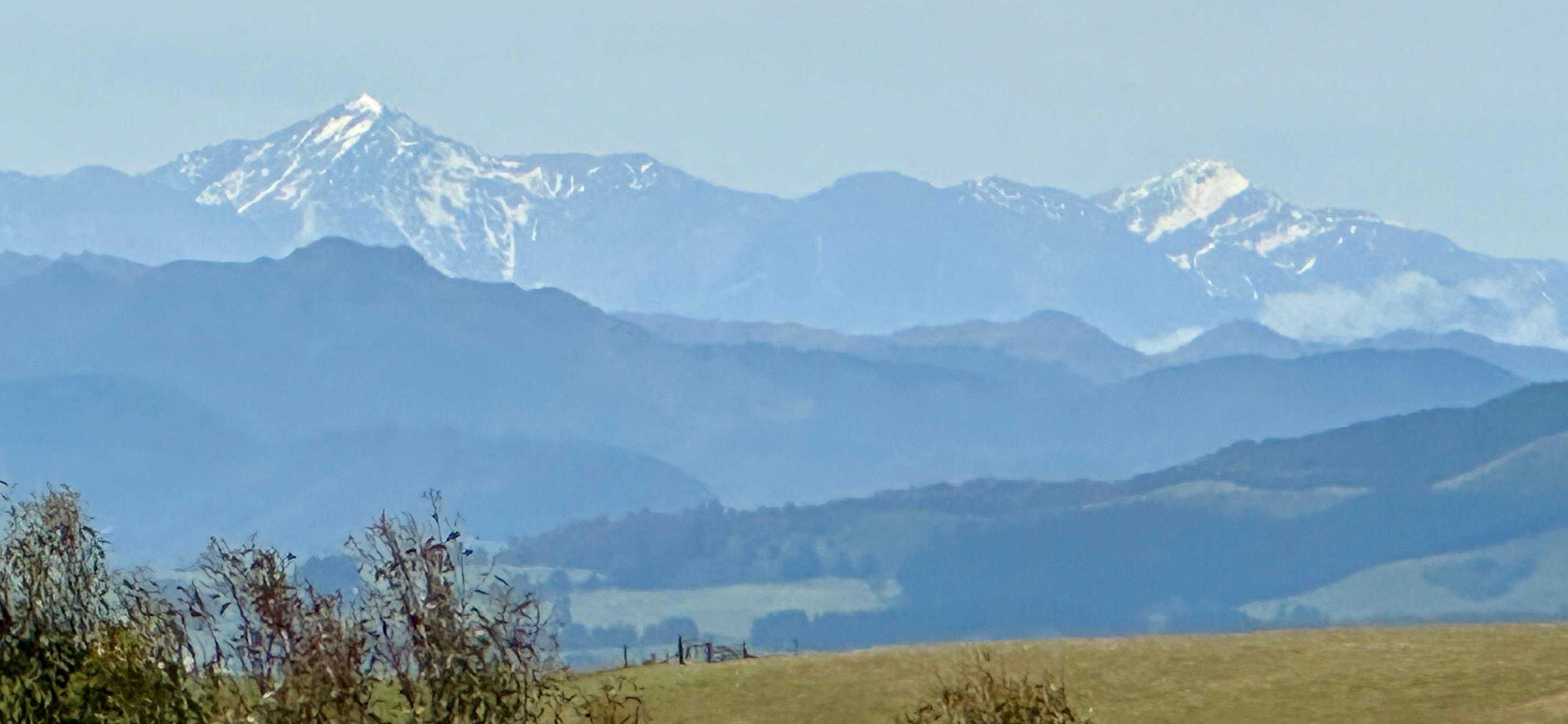 View to the distant snow capped mountains. 