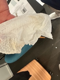What was lightly wiped (dry!) from the AC remote