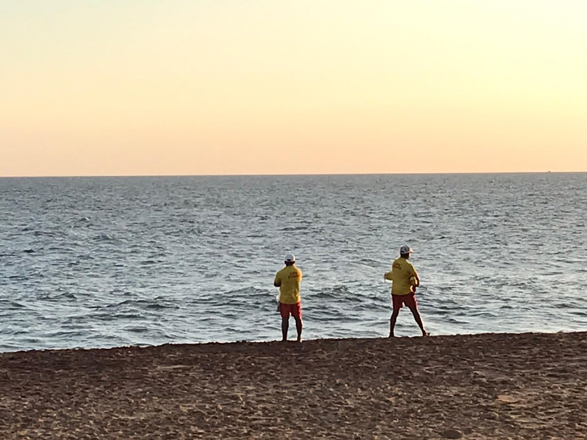 Hotel life guards, watching guests in the sea! They were such lovely lifeguards. 