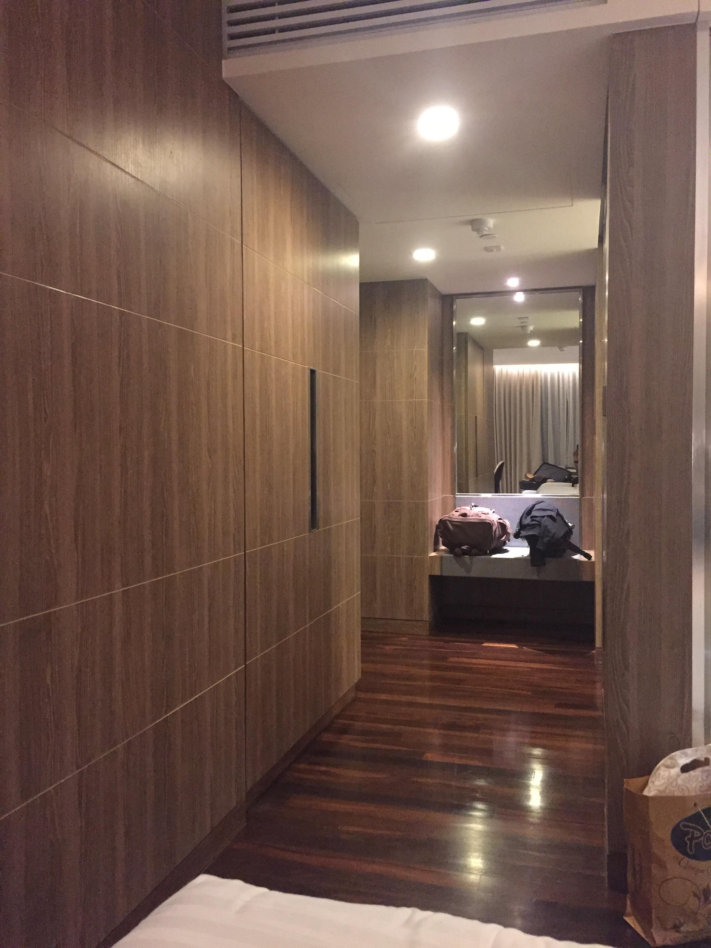 corridor leading to the bed