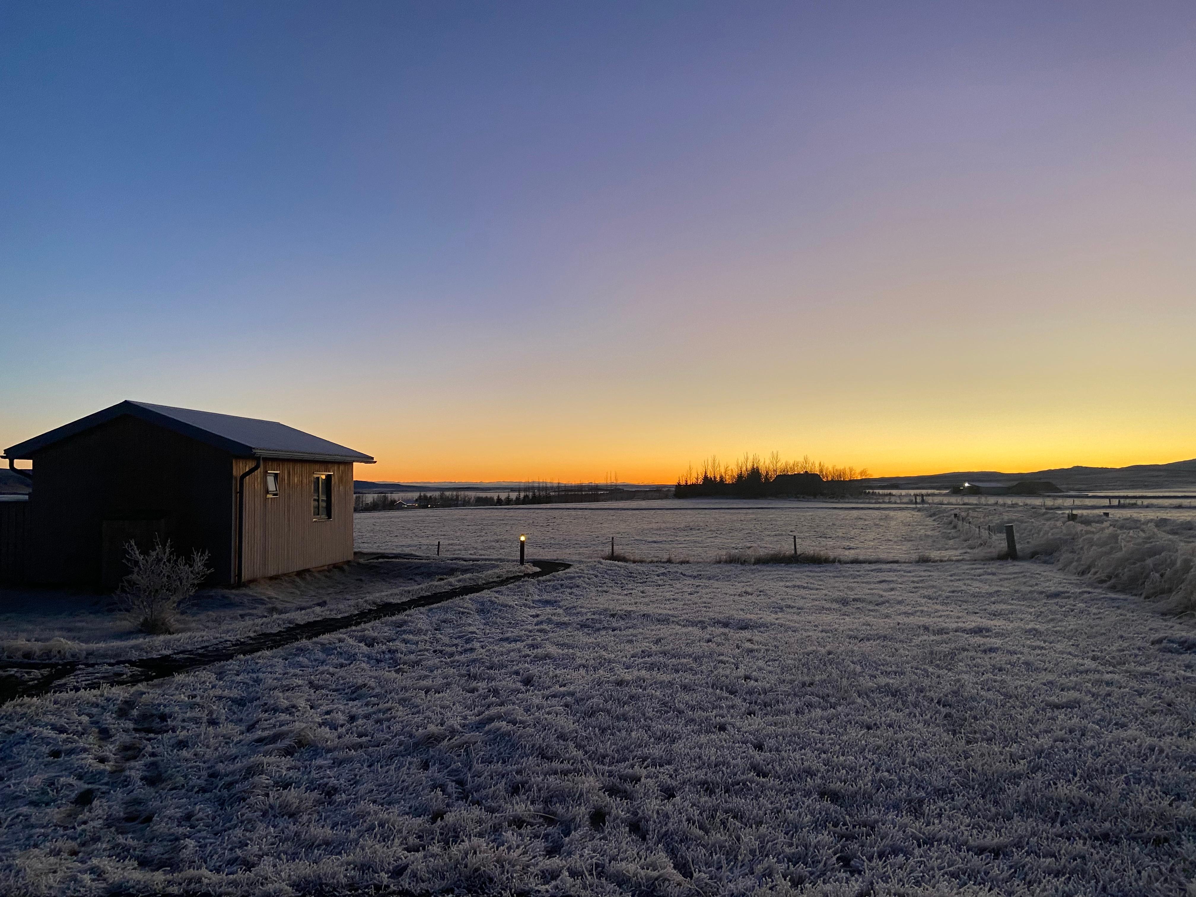 One cottage against a beautiful sunrise