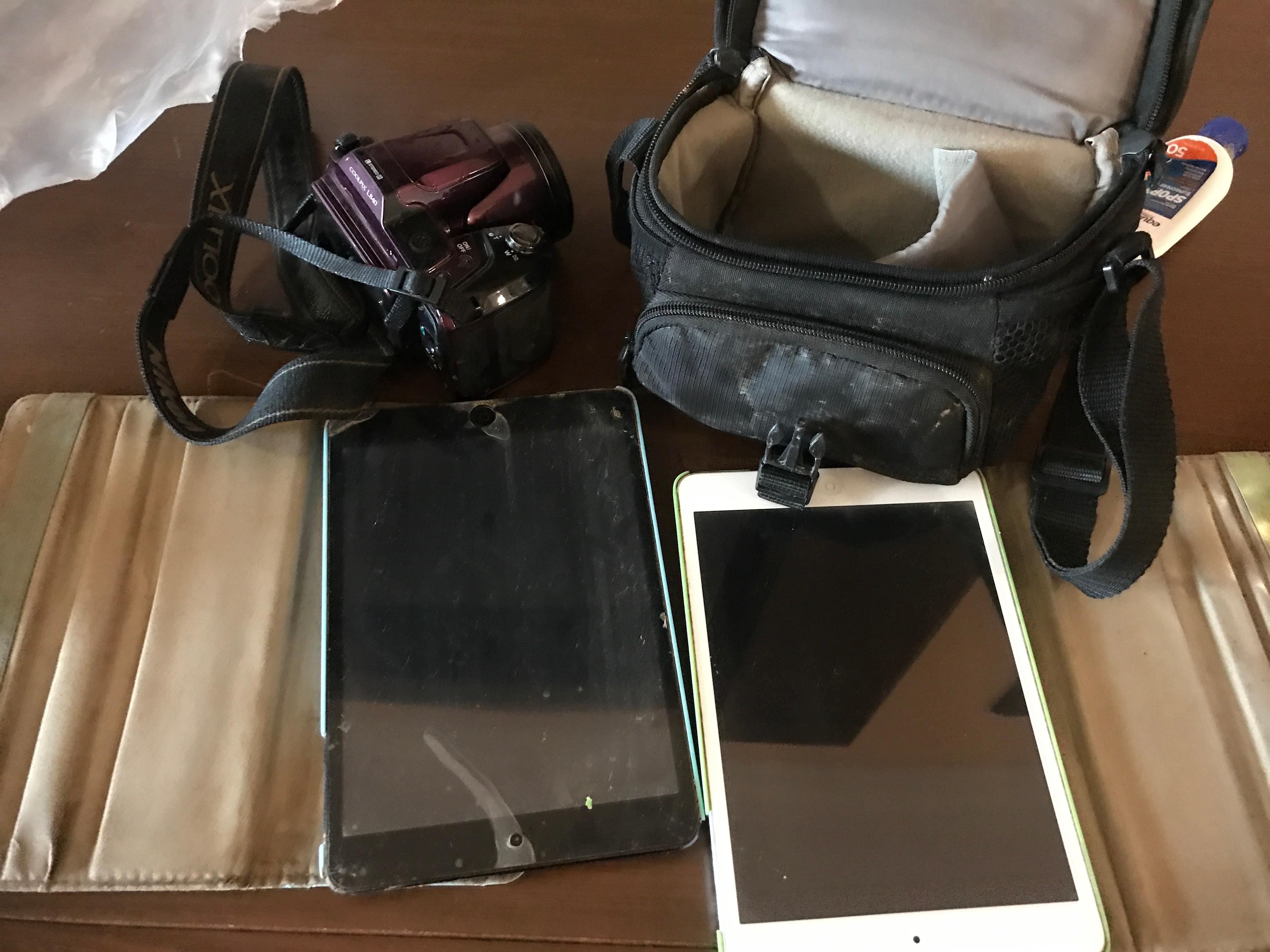 ipads, cameras, watches, keys destroyed