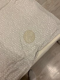 Stain on bed