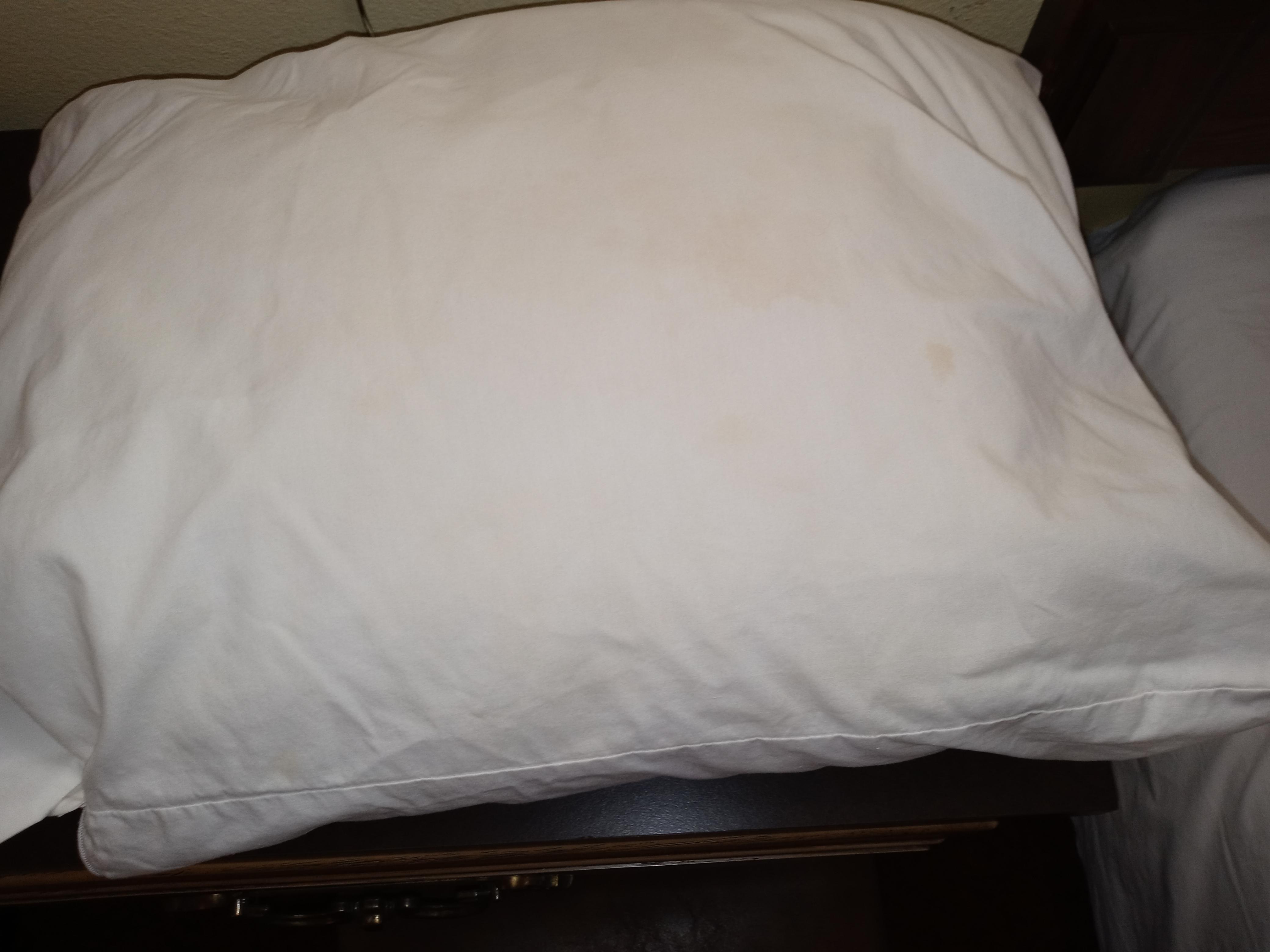 Yellowed white pillow case