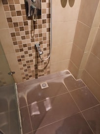 Filthy shower floor.