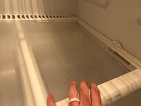 Broken refrigerator drawer.