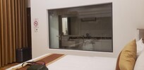Window in to the bathroom??