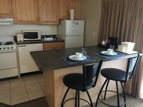 Kitchen and breakfast bar