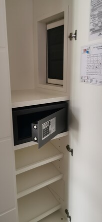 Lots of storage with lighting and a safe.